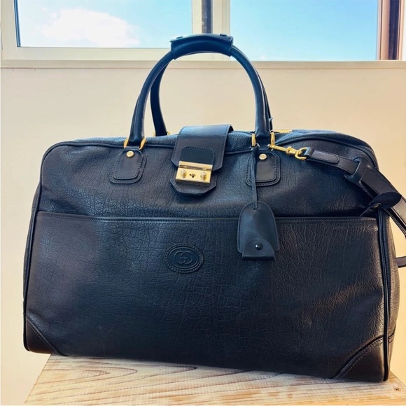 Gucci Other - Gucci Black Leather Duffel Bag with Gold Accents